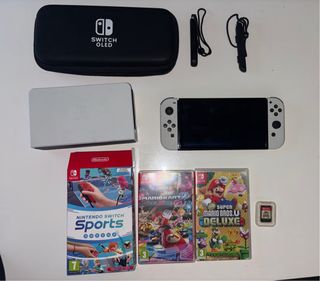 Nintendo Switch OLED + 4 giochi