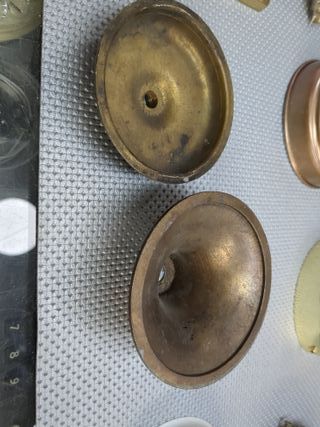 Coppia borchie bronzo per lumi
Rosoni Coprifilo