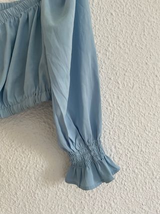 Blusa azul manga larga