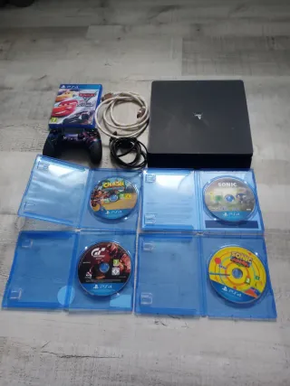 PS4 Negra + Mando y 5 Juegos
