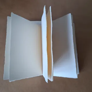 Papel artesano cosido