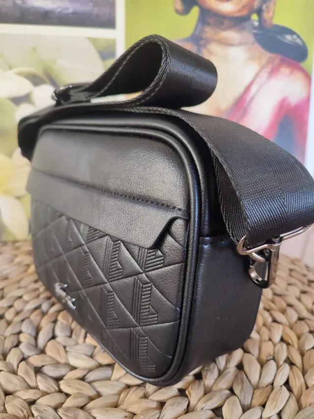 Bandolera Negra de luxe.