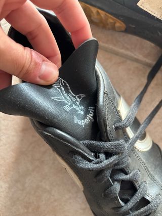 Zapatos de fútbol vintage hierba