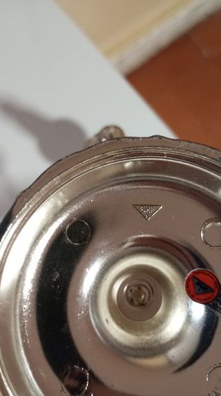 Candelabro de metal plateado