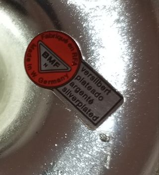 Candelabro de metal plateado