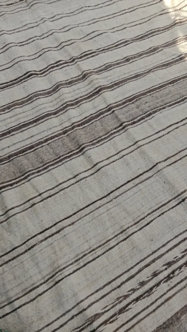 Alfombra sí puede usar como manta es dé lana 100%