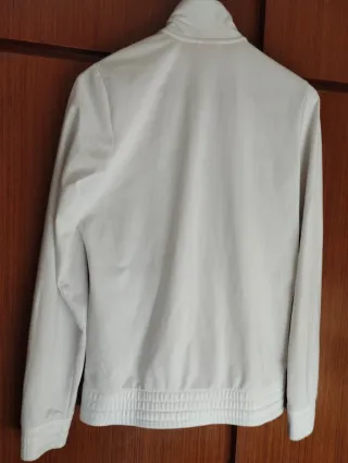 Chaqueta deportiva Puma blanca y rosa