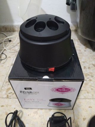 Sevende maquina para quitar uñas de porcelanas.