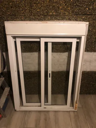 Ventana corredera con persiana