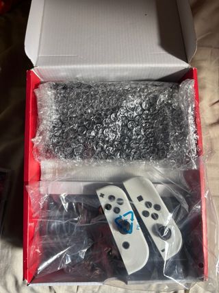 Nintendo Switch OLED Blanca + Mario Kart 8 Deluxe