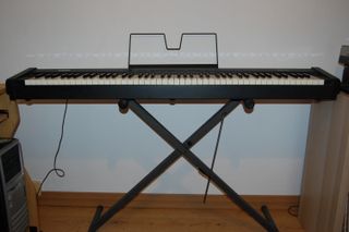 Piano Digital Korg SP-100