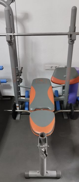 Gimnasio en casa banco pesas multiple