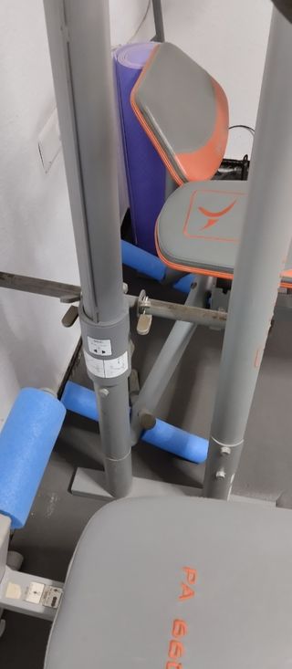 Gimnasio en casa banco pesas multiple