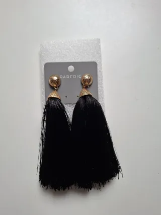 Pendientes Parfois largos negros y dorados