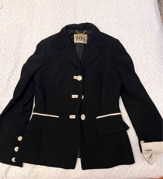 Americana M&K Negra con Ribete Crudo