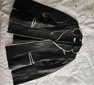 Americana cuero ribete crudo