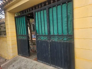 Puerta de hierro 4 hojas