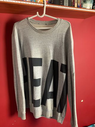 Sudadera gris con estampado HEAT