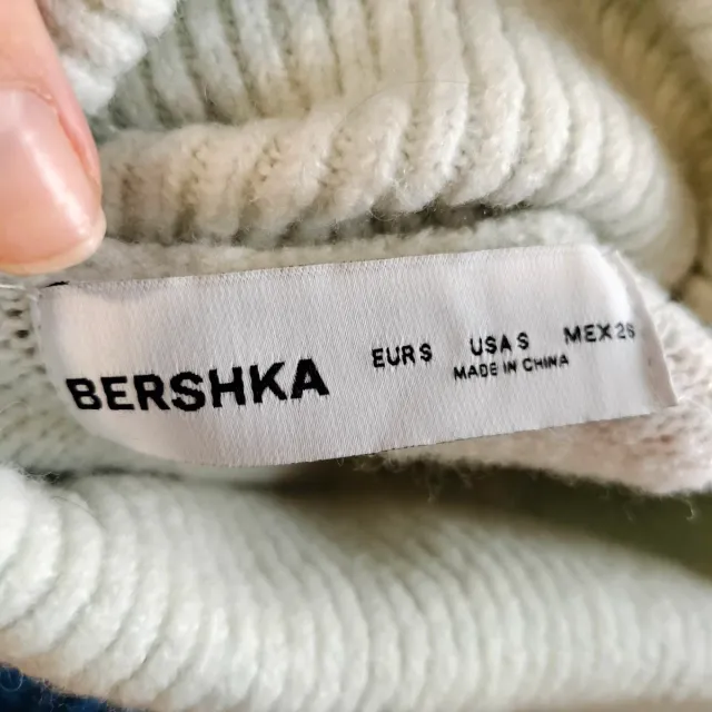 Jersey verde cuello alto