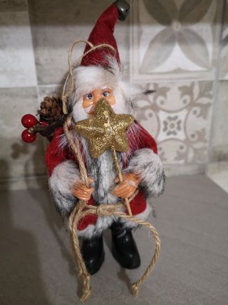 Babbo Natale con stella dorata