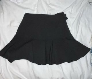 Pantalones de cuero y falda