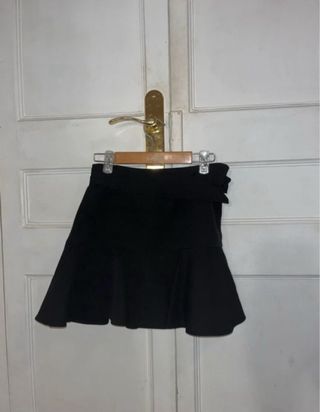 Pantalones de cuero y falda