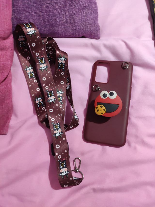 Funda móvil con correa.