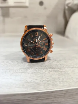 Reloj de pulsera mujer negro y dorado
