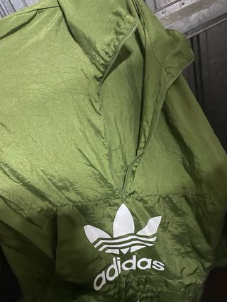 Giacca a vento Adidas verde da donna