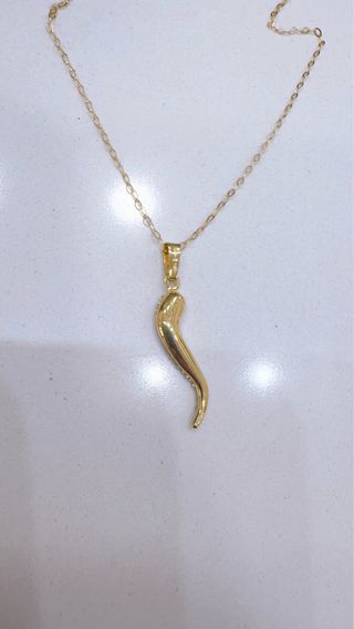 Collana con corno in oro giallo 18kt 750