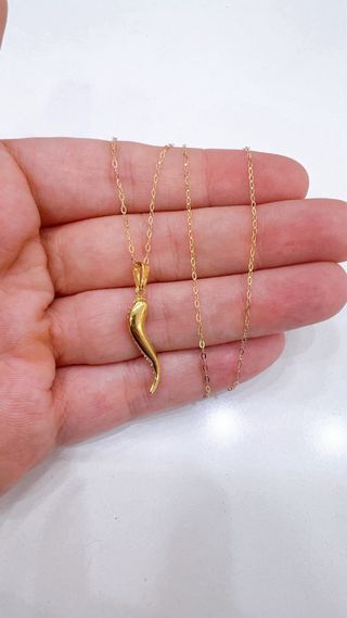 Collana con corno in oro giallo 18kt 750