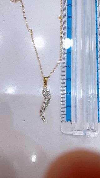 Collana con corno in oro giallo 18kt 750