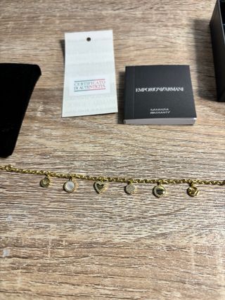 Pulsera Emporio Armani Corazones Dorada Nueva.