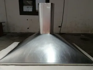 Campana decorativa de acero inox.