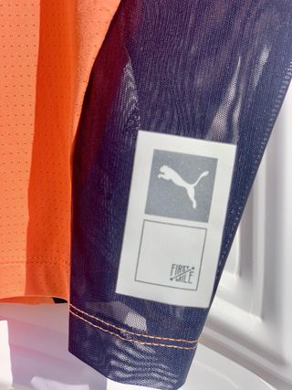 Camiseta Crop Puma Naranja y Gris