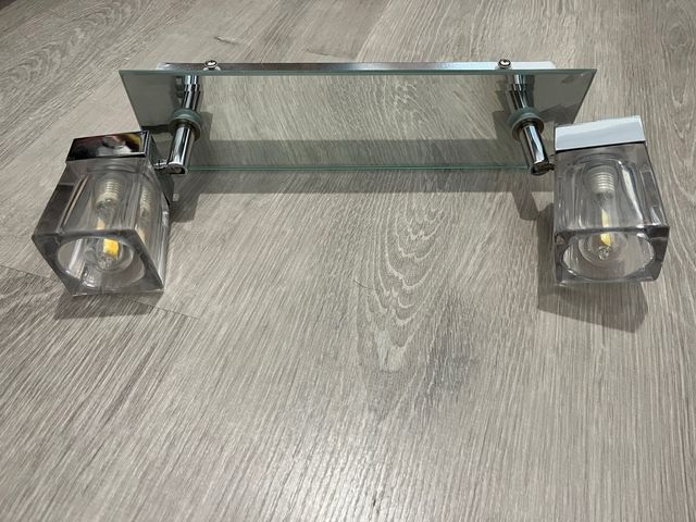 Focos movibles de cristal y metal