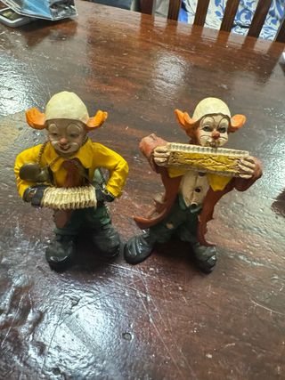 Coppie di soprammobili clown con fisarmonica