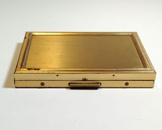 Estuche dorado vintage