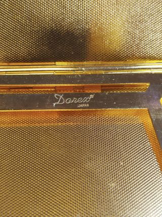 Estuche de metal y falso carey