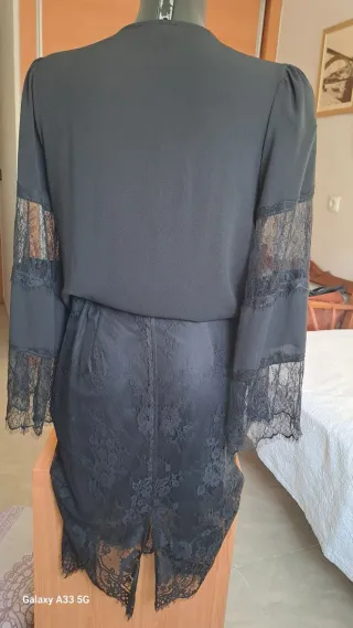 Elegante conjunto falda y blusa negro
