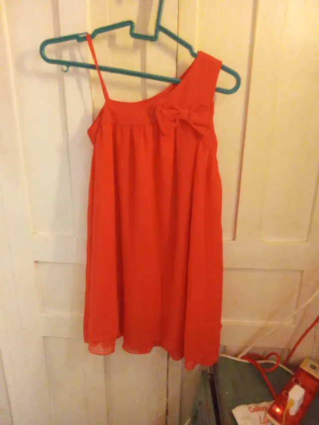 Blusa infantil roja con lazo