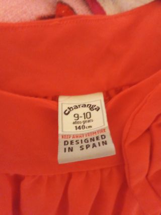 Blusa infantil roja con lazo