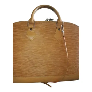 Ejemplo de Restauración Louis Vuitton Alma PM