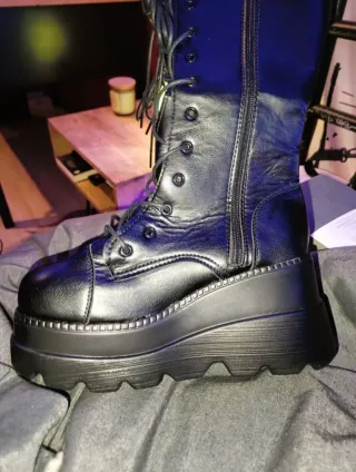 Black knee-high platform boots