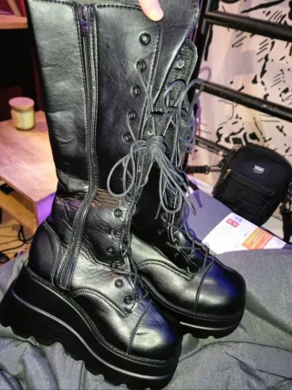 Black knee-high platform boots