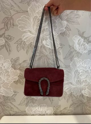 Bolso piel burdeos con serpiente