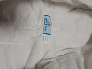 Sacco neonato bianco con orsetto