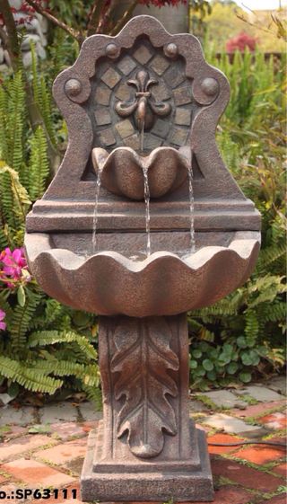 Fuente de pared de piedra