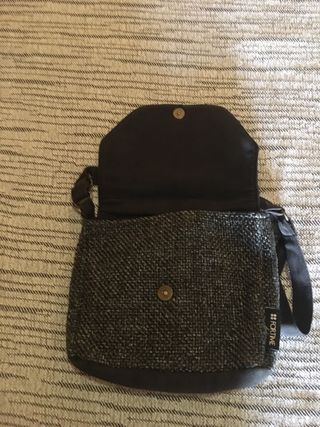 Bolso Fortime negro y dorado con pedrería