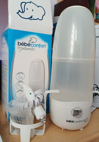 Calienta bibis + carrusel cuna + saca leches manua